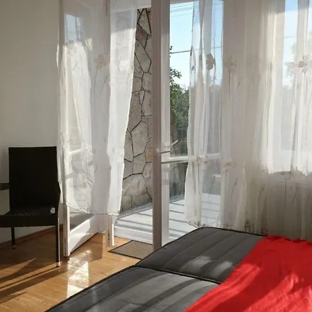 Holiday home Doppelhaushaelfte Fuer Sechs Personen Mit Terrasse Szantod